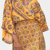 Vestido Candela Boho con Estampado Floral y Escote Cruzado en V