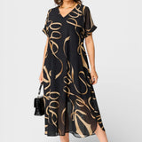 Emma™ | Vestido elegante negro y dorado
