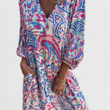 Vestido Maxi Bohemio Carmina con Escote en V y Estampado Abstracto