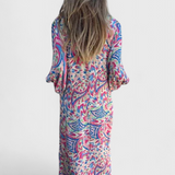 Vestido Maxi Bohemio Carmina con Escote en V y Estampado Abstracto