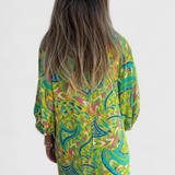 Vestido Maxi Bohemio Carmina con Escote en V y Estampado Abstracto