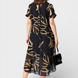 Emma™ | Vestido elegante negro y dorado