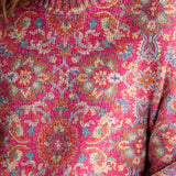 Claudia™ | Jersey floral de cuello alto