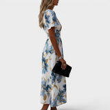 Natalia™ | Vestido midi floral cruzado elegante