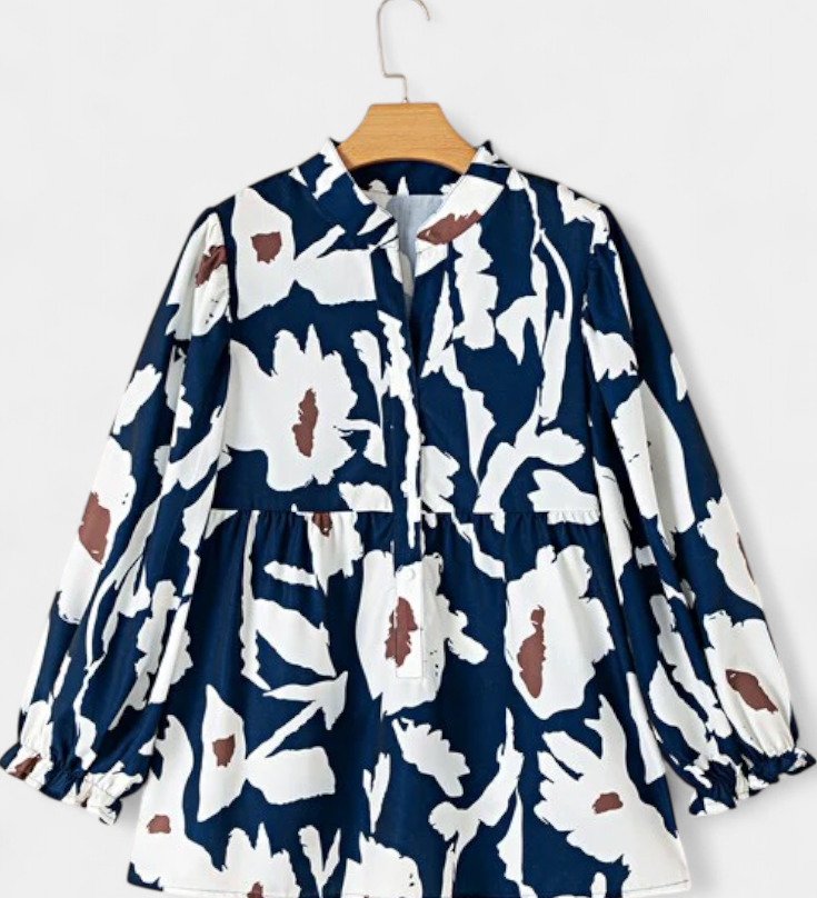 Blusa Filomena con Media Abotonadura y Mangas Abullonadas en Estampado Floral Abstracto